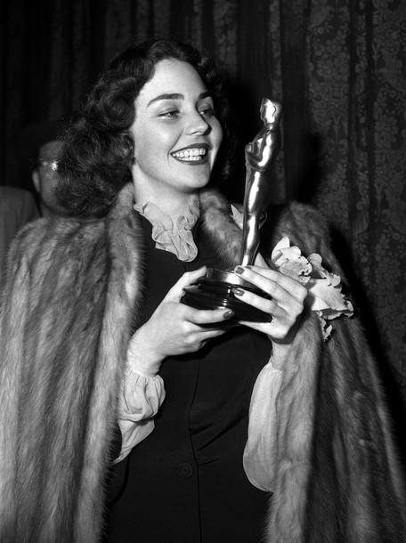 Handout photo shows actress Jones holding her Academy Award for her titular role in "The Song of Bernadette" during the awards ceremony in Hollywood